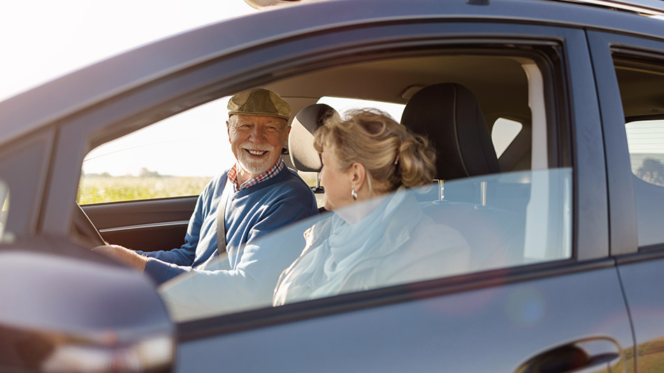 A couple in a car together with the window down "Can I Drive 2 Days After Cataract Surgery?